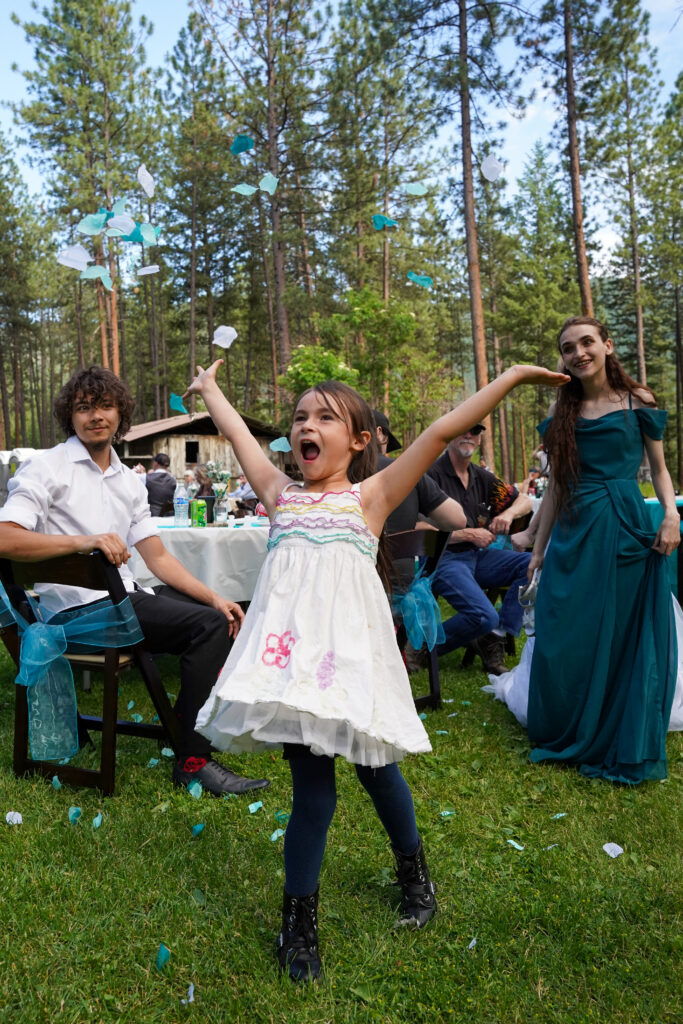 Girl throwing flowers