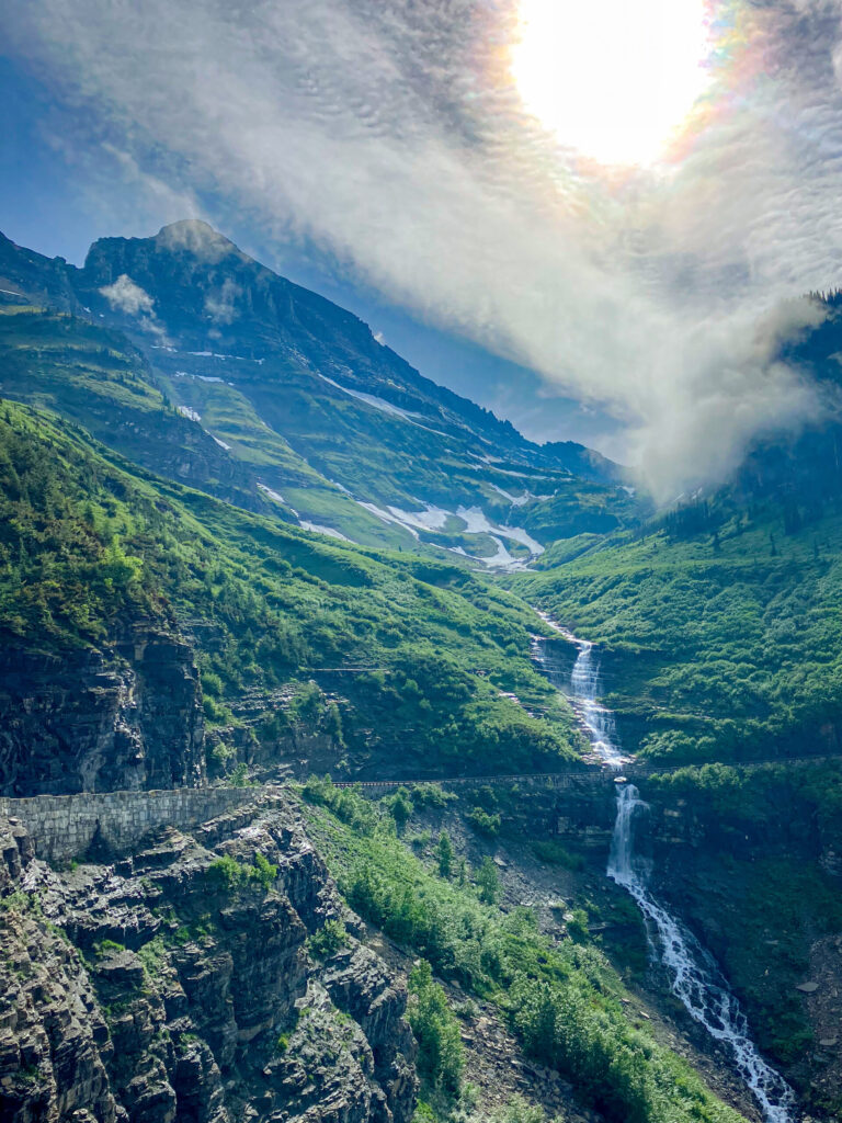 The sun shining over Glacier National Park